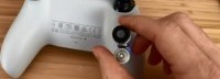 显微镜下PS5手柄背面纹理细节：让手变成PS5的形状
